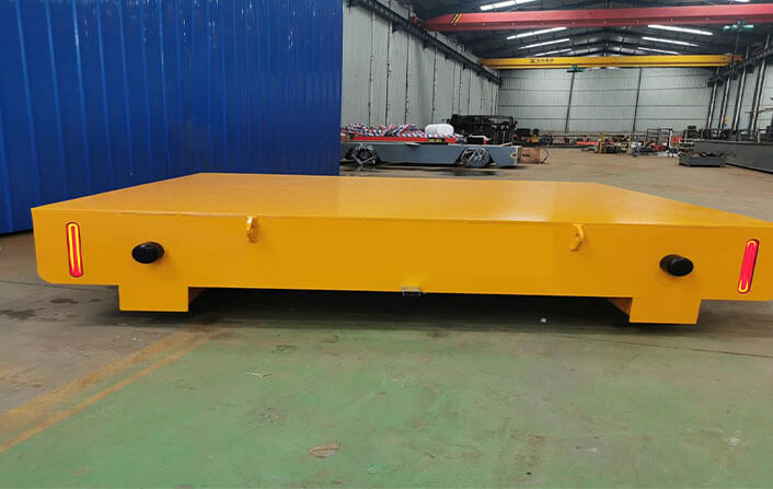 Trackless electric flat car industrial plant handling goods